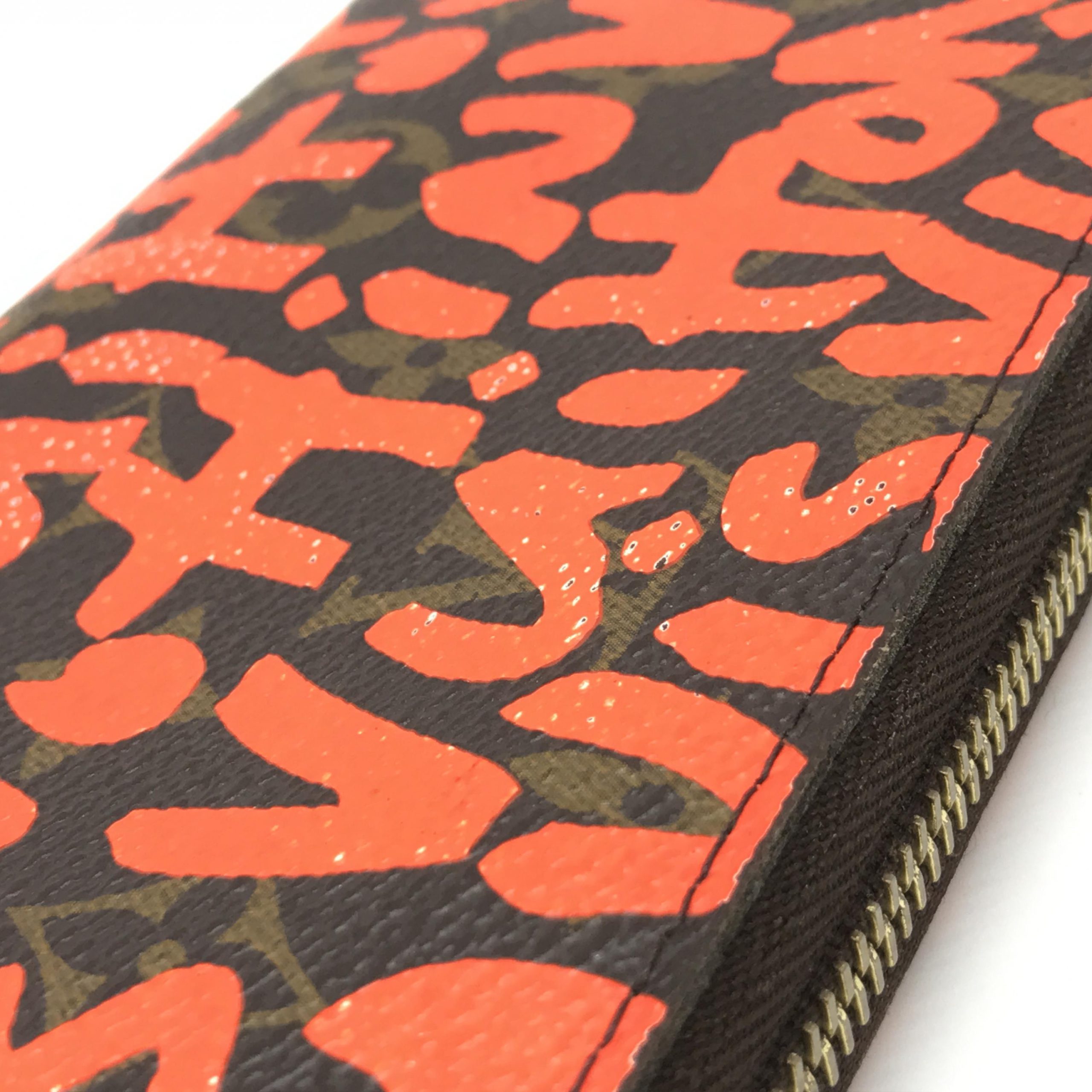 LOUIS VUITTON LIMITED EDITION STEPHEN SPROUSE ZIPPY WALLET – The