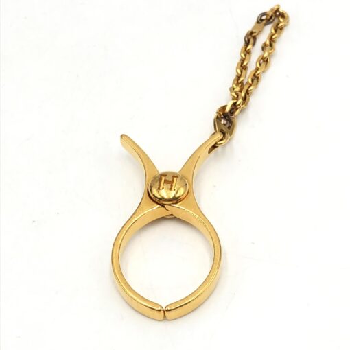 Hermès - Gold Metal Glove Holder Keychain